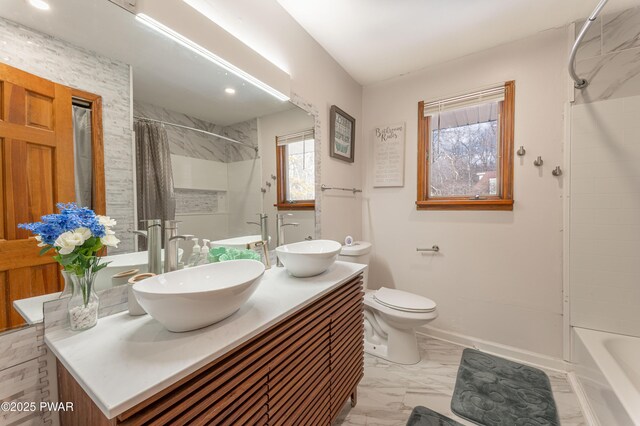 65 N Shore Dr, Albrightsville, PA 18210 - bathroom featuring toilet, shower / bath combination with curtain, marble finish floor, and a sink