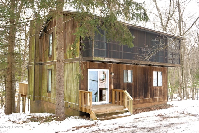 view of snow covered property