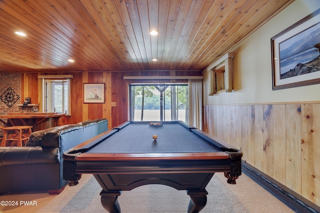 playroom with carpet, wood walls, wood ceiling, and pool table