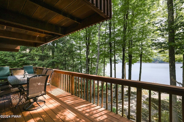 wooden terrace with a water view