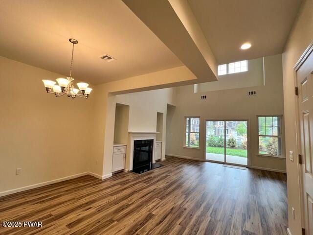 kitchen with dark stone counters, a sink, and stainless steel appliances
