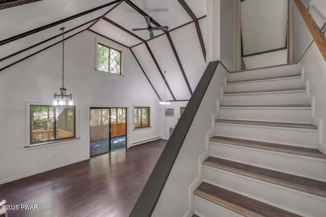 268 S Fairway Dr, Lake Ariel, PA 18436 - staircase featuring a baseboard heating unit, a chandelier, high vaulted ceiling, healthy amount of natural light, and a ceiling fan