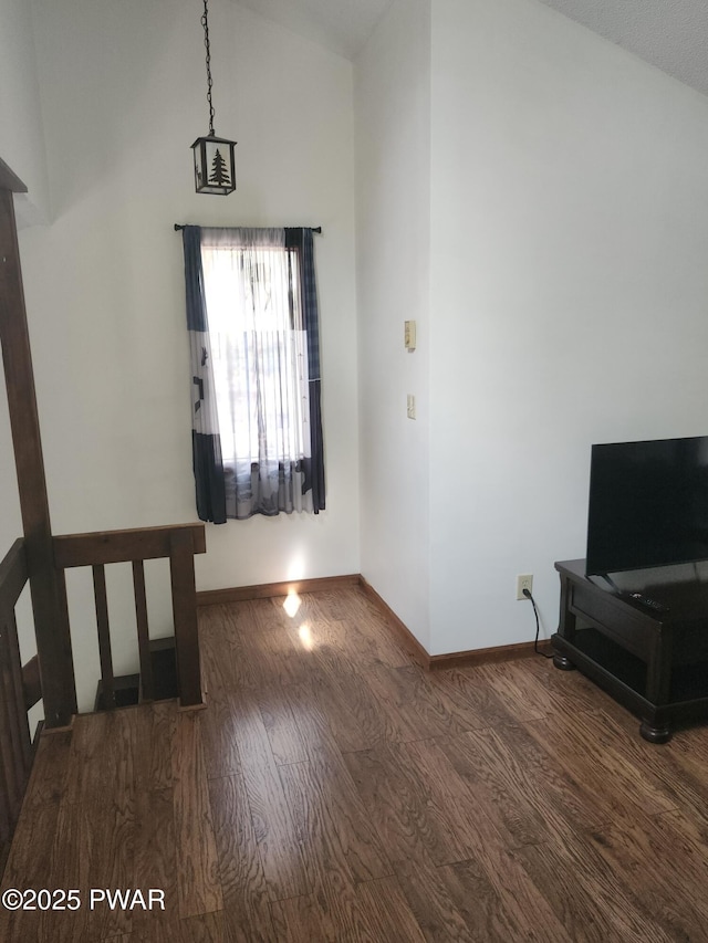 16 Gate Ct S Unit 2258, Lake Ariel, PA 18436 - living area with lofted ceiling, wood finished floors, and baseboards