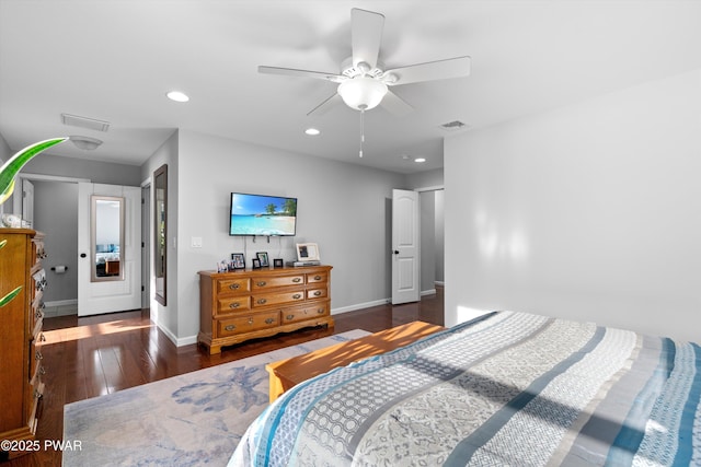 bedroom with dark wood-type flooring and ceiling fan