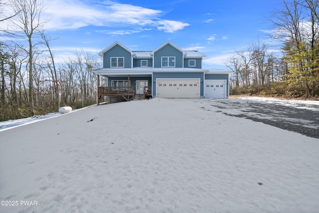 view of front of house with a garage and covered porch