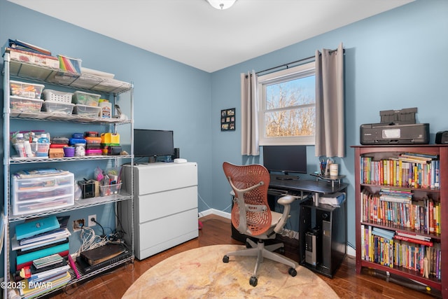 office space with dark hardwood / wood-style flooring