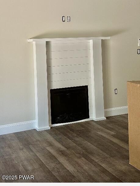 119 Lenape Dr, Milford, PA 18337 - detailed view of wood finished floors and a fireplace