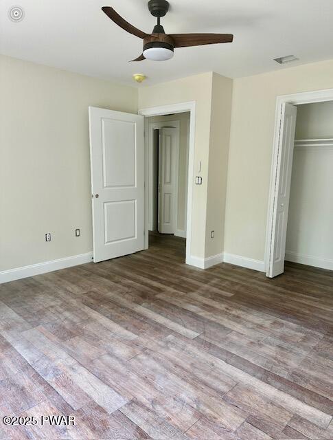 119 Lenape Dr, Milford, PA 18337 - unfurnished bedroom with wood finished floors, a closet, and ceiling fan