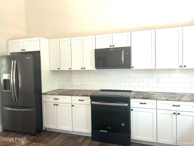 119 Lenape Dr, Milford, PA 18337 - kitchen featuring black appliances, dark stone counters, white cabinets, and dark wood-style flooring