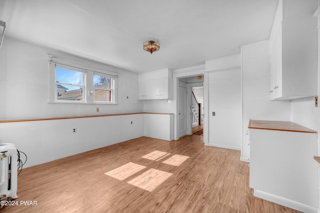 kitchen featuring white cabinets