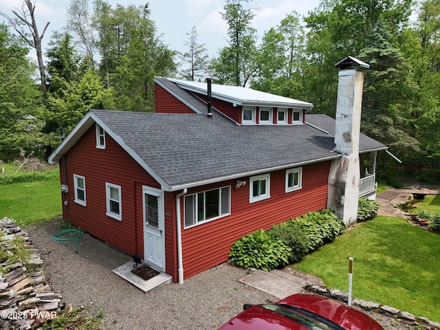 114 Springbrook Ln, Greentown, PA 18426 - back of house with a shingled roof, a chimney, and a lawn