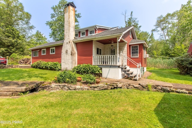 114 Springbrook Ln, Greentown, PA 18426 - view of front of home featuring a ceiling fan, a front yard, a chimney, and a porch