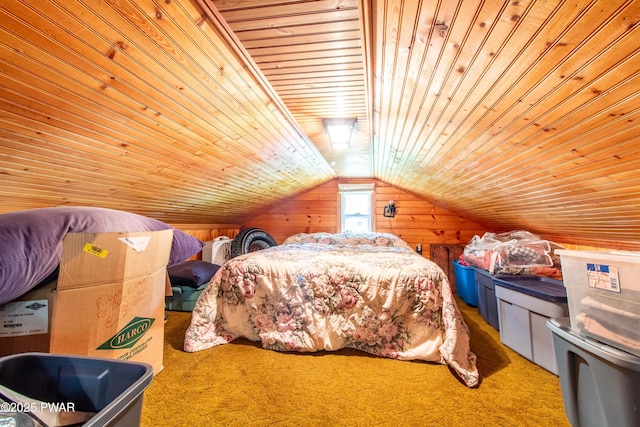 114 Springbrook Ln, Greentown, PA 18426 - bedroom featuring wood ceiling, wood walls, vaulted ceiling, and carpet floors