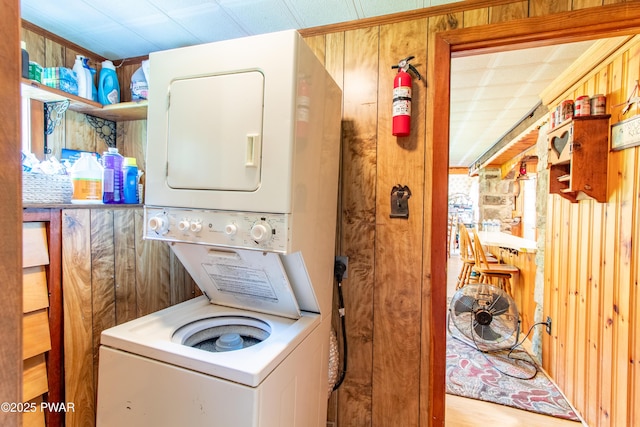 114 Springbrook Ln, Greentown, PA 18426 - laundry area with stacked washer / drying machine and wooden walls
