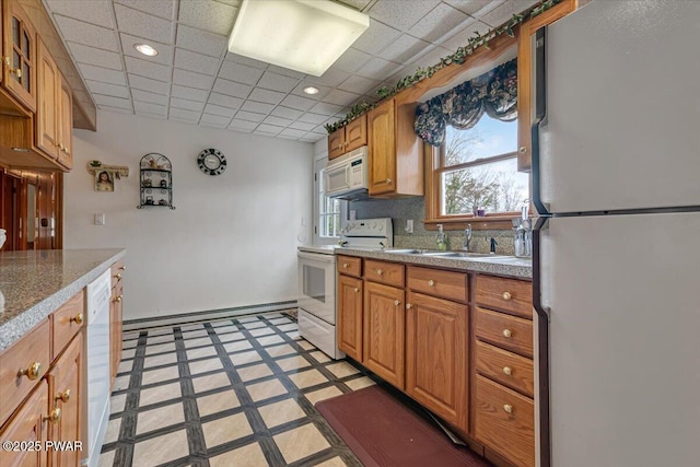 111 N Redwood Dr, Greentown, PA 18426 - kitchen featuring white appliances, baseboard heating, recessed lighting, and a sink