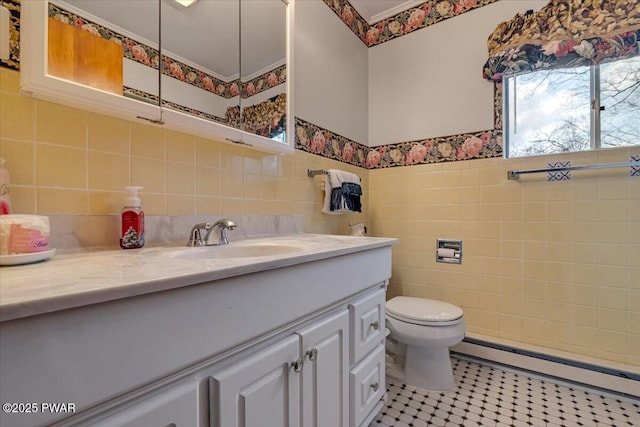 111 N Redwood Dr, Greentown, PA 18426 - bathroom with tile walls, baseboard heating, toilet, and vanity