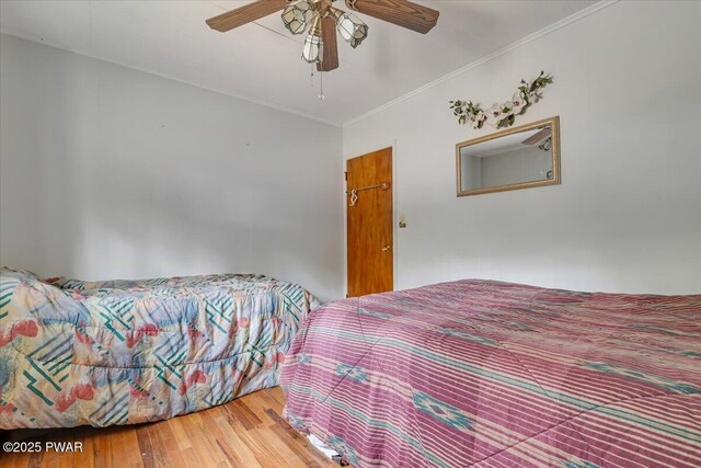 111 N Redwood Dr, Greentown, PA 18426 - bedroom with a ceiling fan, ornamental molding, vaulted ceiling, and wood finished floors
