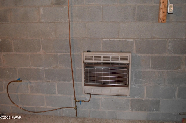 room details with heating unit and concrete block wall