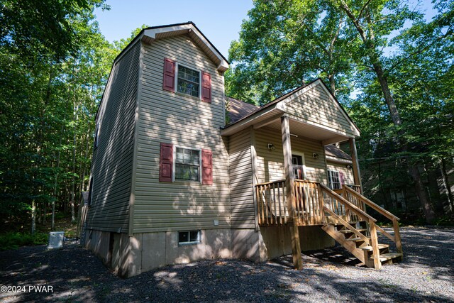 view of front of house with cooling unit