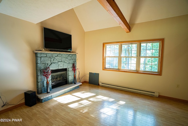 unfurnished living room featuring vaulted ceiling with beams, a fireplace, light wood-type flooring, and baseboard heating