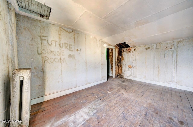 unfurnished room featuring wood-type flooring