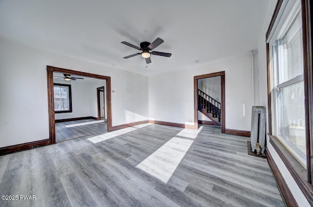 unfurnished living room featuring light wood-type flooring