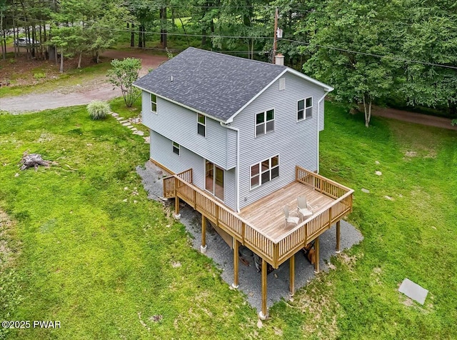 1039 Towpath Rd, Hawley, PA 18428 - back of property featuring roof with shingles, a deck, and a chimney