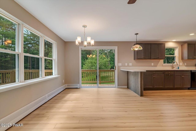 1039 Towpath Rd, Hawley, PA 18428 - kitchen featuring a baseboard radiator, light countertops, plenty of natural light, light wood-type flooring, and recessed lighting