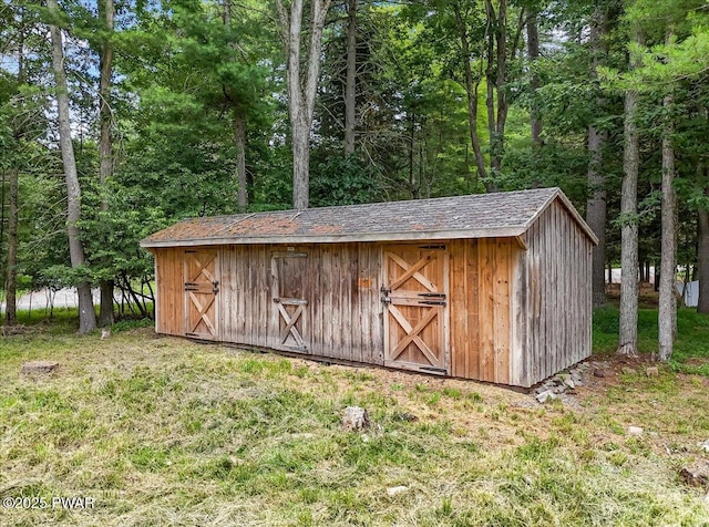 1039 Towpath Rd, Hawley, PA 18428 - view of shed featuring a wooded view
