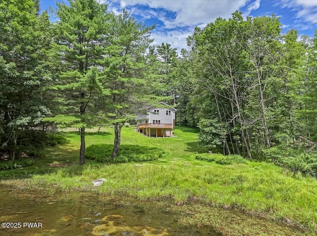 1039 Towpath Rd, Hawley, PA 18428 - view of yard with a wooden deck and a wooded view