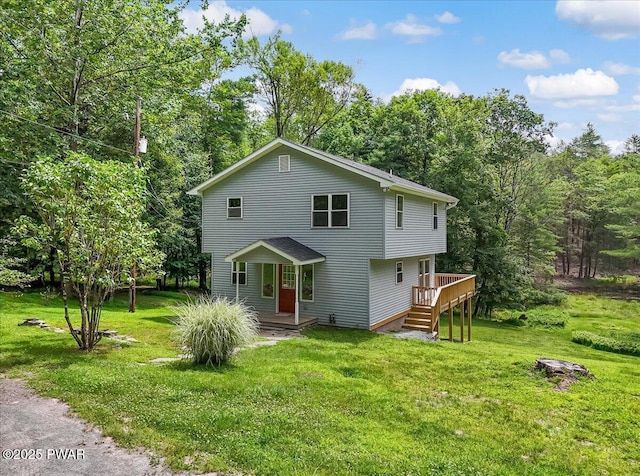 1039 Towpath Rd, Hawley, PA 18428 - view of front of home with a front yard and a wooden deck