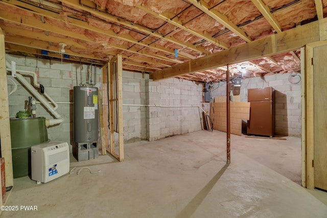 1086 Hampstead Rd, Bushkill, PA 18324 - unfinished basement with electric water heater and fridge