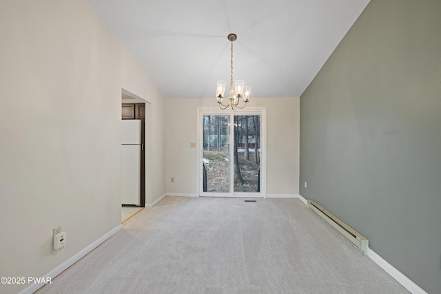 carpeted spare room featuring lofted ceiling, an inviting chandelier, and baseboard heating