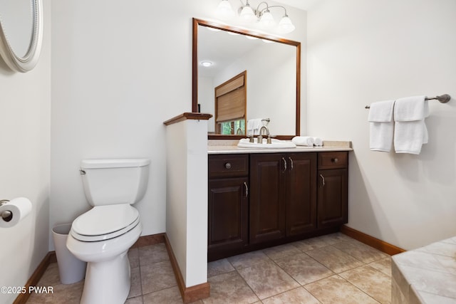119 Canoebrook Dr, Hawley, PA 18428 - bathroom with toilet, vanity, baseboards, and tile patterned flooring