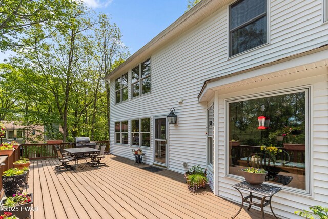 119 Canoebrook Dr, Hawley, PA 18428 - deck featuring outdoor dining area and a grill