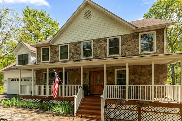 119 Canoebrook Dr, Hawley, PA 18428 - view of front facade with stone siding, a porch, and a garage