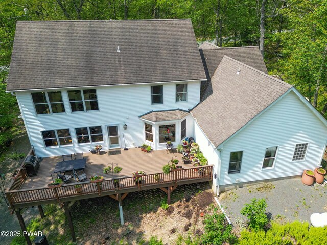 119 Canoebrook Dr, Hawley, PA 18428 - rear view of property with a deck and roof with shingles
