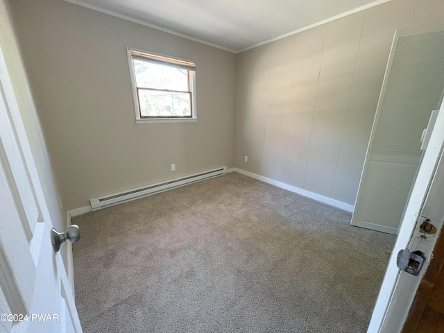 carpeted empty room with baseboard heating