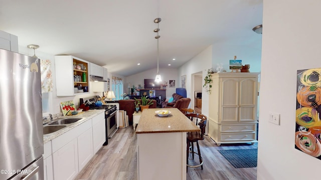 139 Chestnut St, Dingmans Ferry, PA 18328 - kitchen with appliances with stainless steel finishes, light wood-type flooring, lofted ceiling, a kitchen island, and open shelves