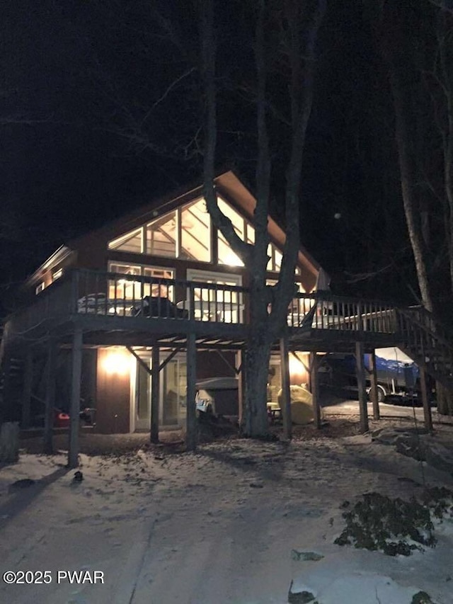 1749 Rockpoint Ct, Lake Ariel, PA 18436 - back of house at twilight with a wooden deck