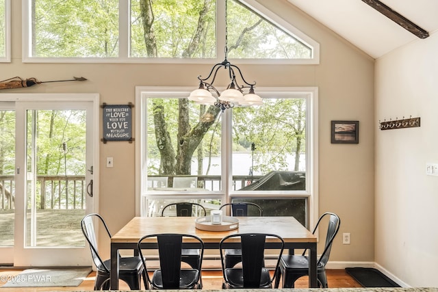 1749 Rockpoint Ct, Lake Ariel, PA 18436 - dining room featuring a chandelier, plenty of natural light, wood finished floors, and baseboards