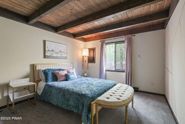 carpeted bedroom with baseboards, wooden ceiling, and beamed ceiling