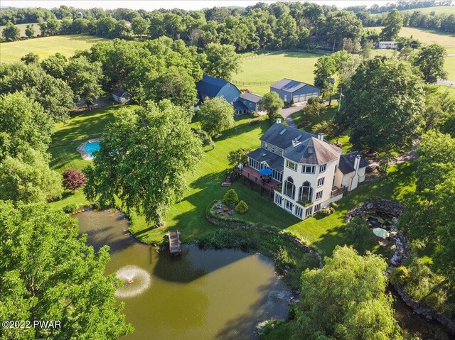 bird's eye view with a water view