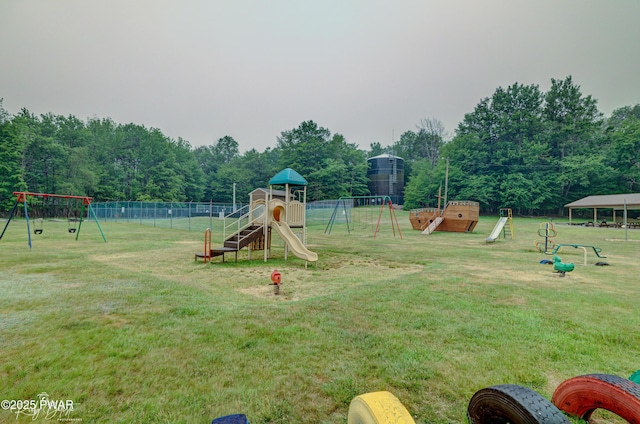 communal playground with a lawn