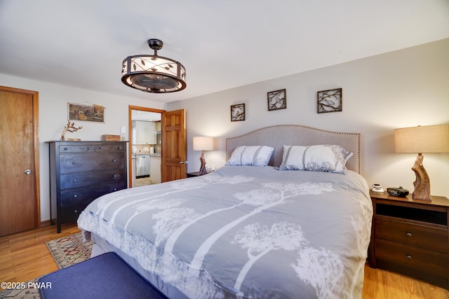 bedroom featuring light wood finished floors