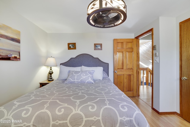 bedroom with light wood finished floors
