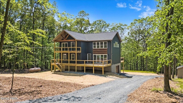 128 Copper Mountain Dr, Tafton, PA 18464 - view of front of house featuring a wooden deck and dirt driveway