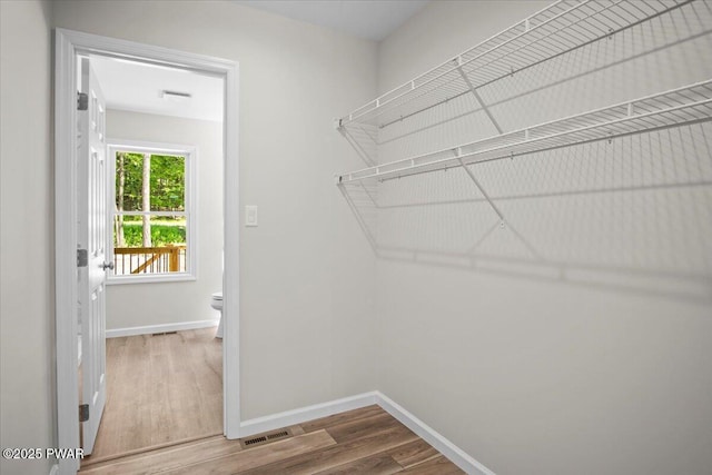 128 Copper Mountain Dr, Tafton, PA 18464 - walk in closet featuring wood finished floors