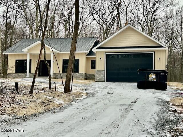 view of front of property with a garage