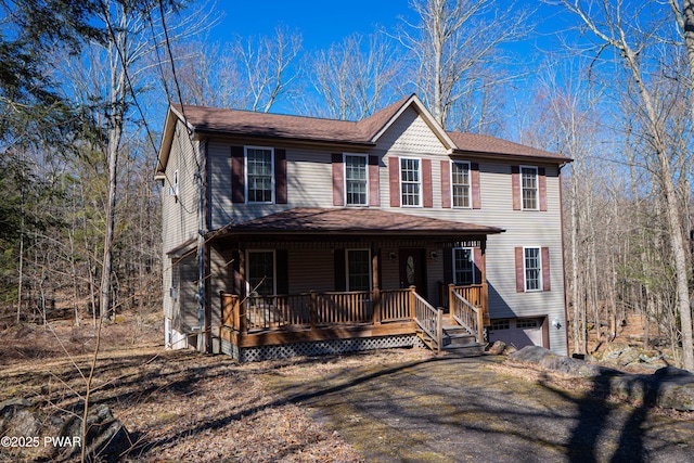 92 Thornwood Ter, Lake Ariel, PA 18436 - view of front of house with covered porch and a garage